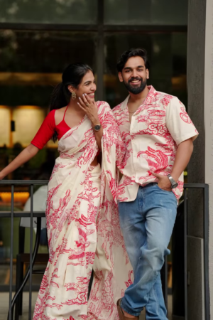 Couple’s Coordinated Ethnic Ensemble – White & Red Printed Saree with Matching Shirt and Jeans