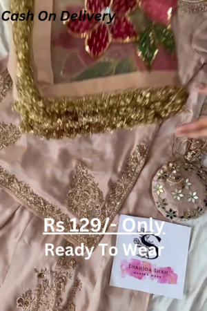 Rose Gold Splendor: Embroidered Silk Suit with Potli Bag