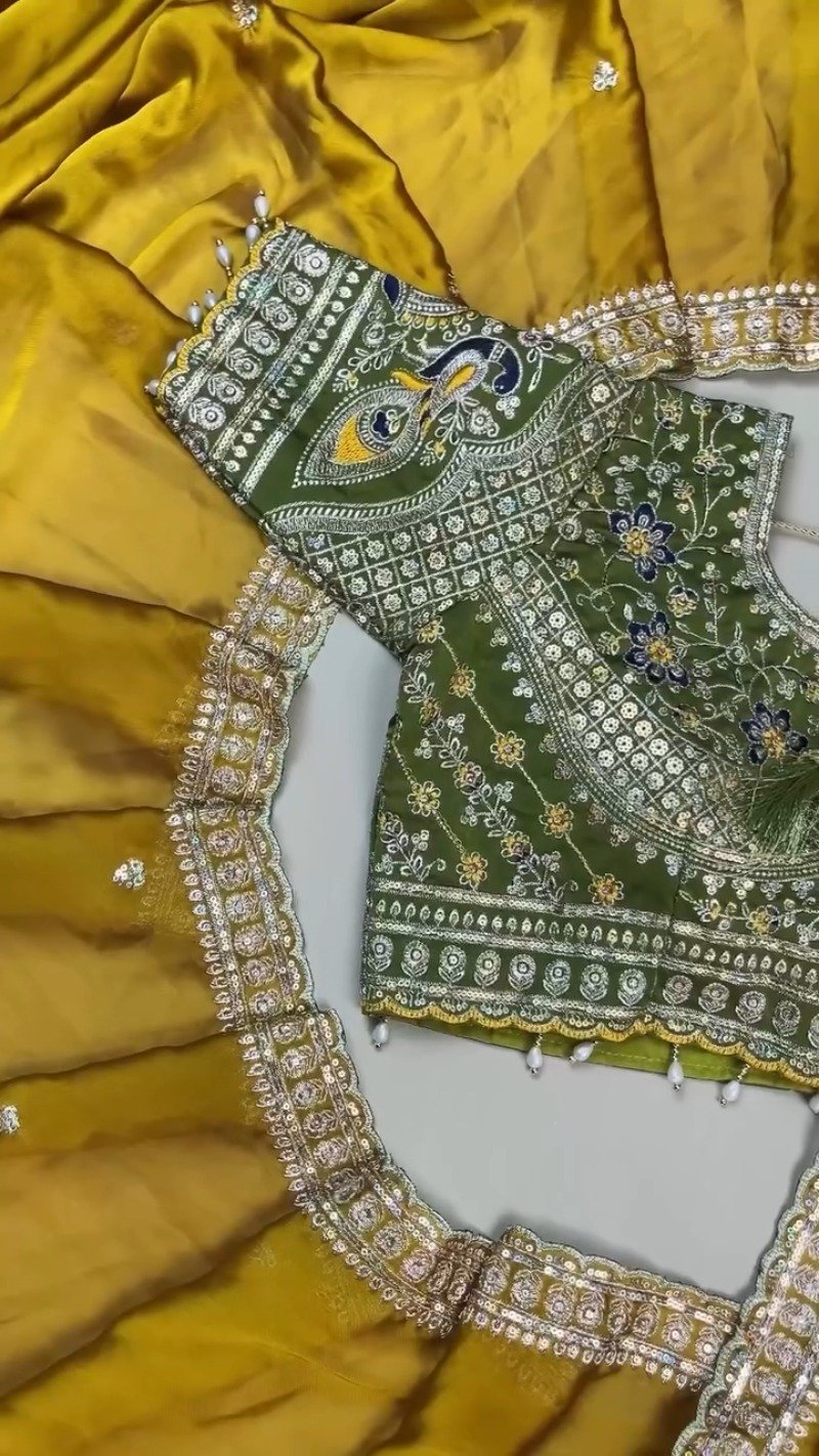Olive Green Embroidered Silk Blouse with Mustard Yellow Saree โ A Masterpiece of Traditional Elegance