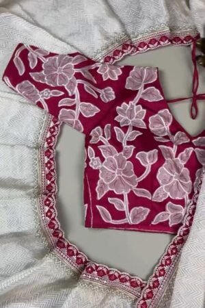 Ivory Chevron Pattern Saree with Embellished Deep Magenta Blouse – Elegant Festive Drape