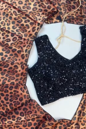 Sultry Leopard Print Organza Saree with Embellished Sequin Blouse