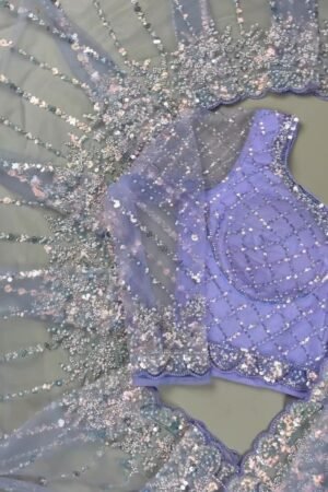 Enchanting Lavender Sequined Net Saree with Intricate Diamond-Grid Blouse
